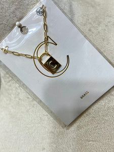 Farah Gold Tone Initial Lock Necklace