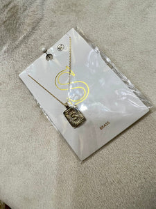 Farah Gold Tone Initial Lock Necklace