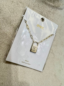 Farah Gold Tone Initial Lock Necklace