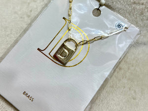 Farah Gold Tone Initial Lock Necklace