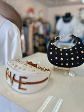 Load image into Gallery viewer, "D" Inspired "LOVE" crescent shaped Gold Studded Vegan Leather  Bag