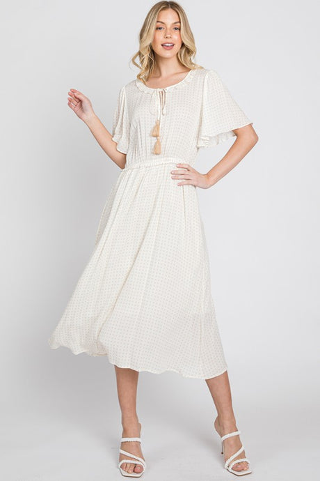 Cleo Cream Polka Dot Frill Dress with Tassel Detail Tie