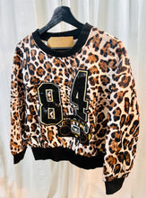 Load image into Gallery viewer, Mocha Animal Print Embellished 84&#39; Round Neck Silky Long Sleeve Top