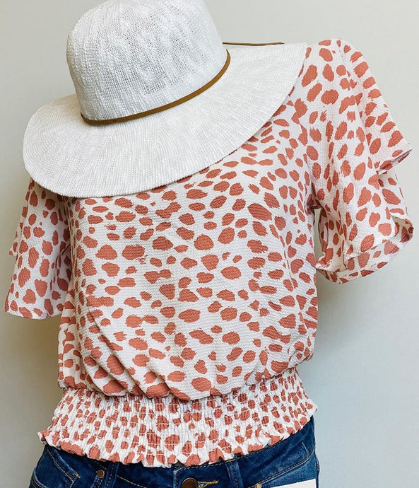 Clearance** Clay Animal Pattern with Dolman Flowy Sleeved Top